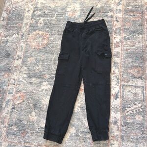 Monkey ride jeans. Black. Size 1/25. Elastic at waist and bottom of pants.